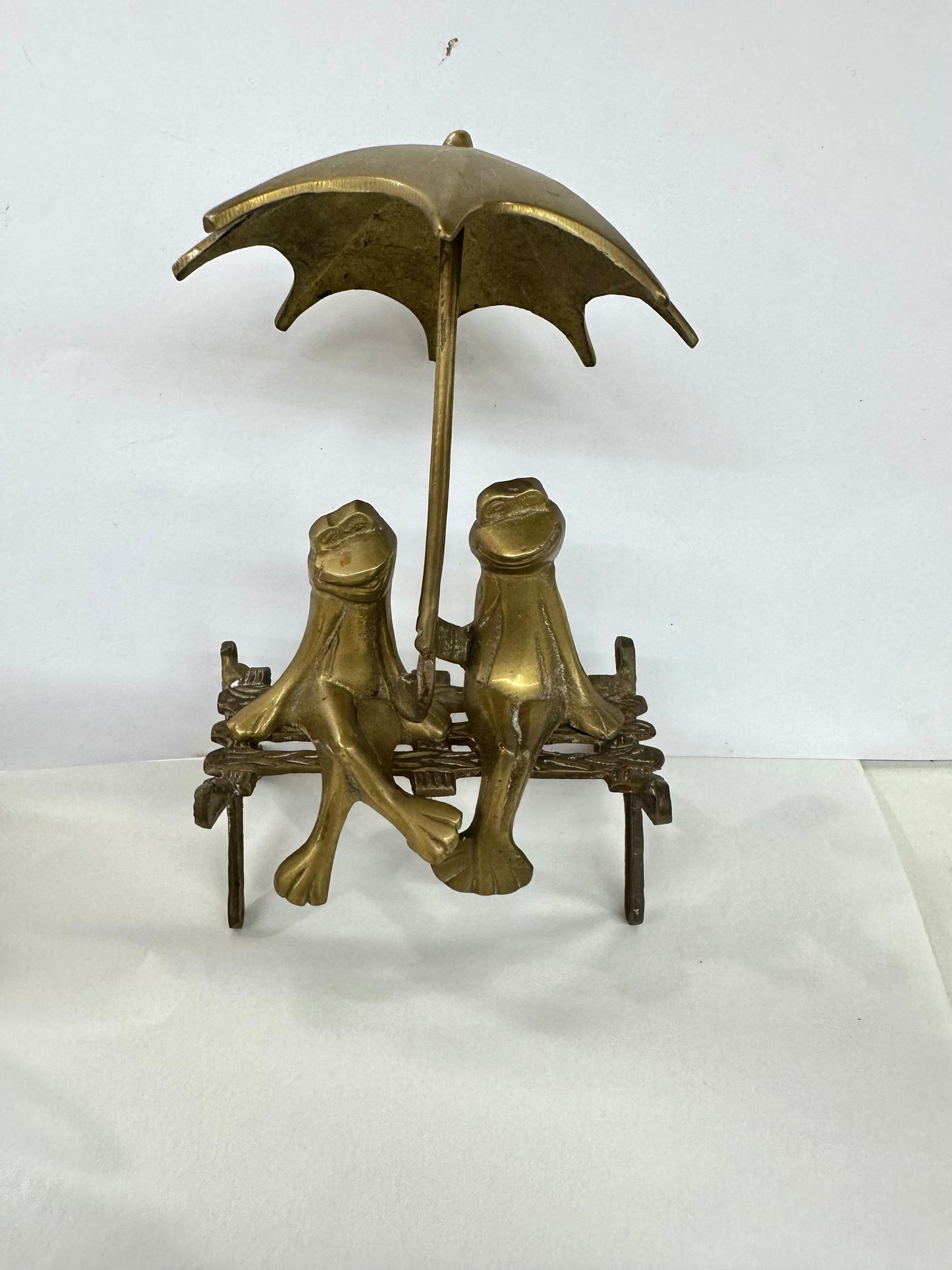 Brass Frogs On Bench