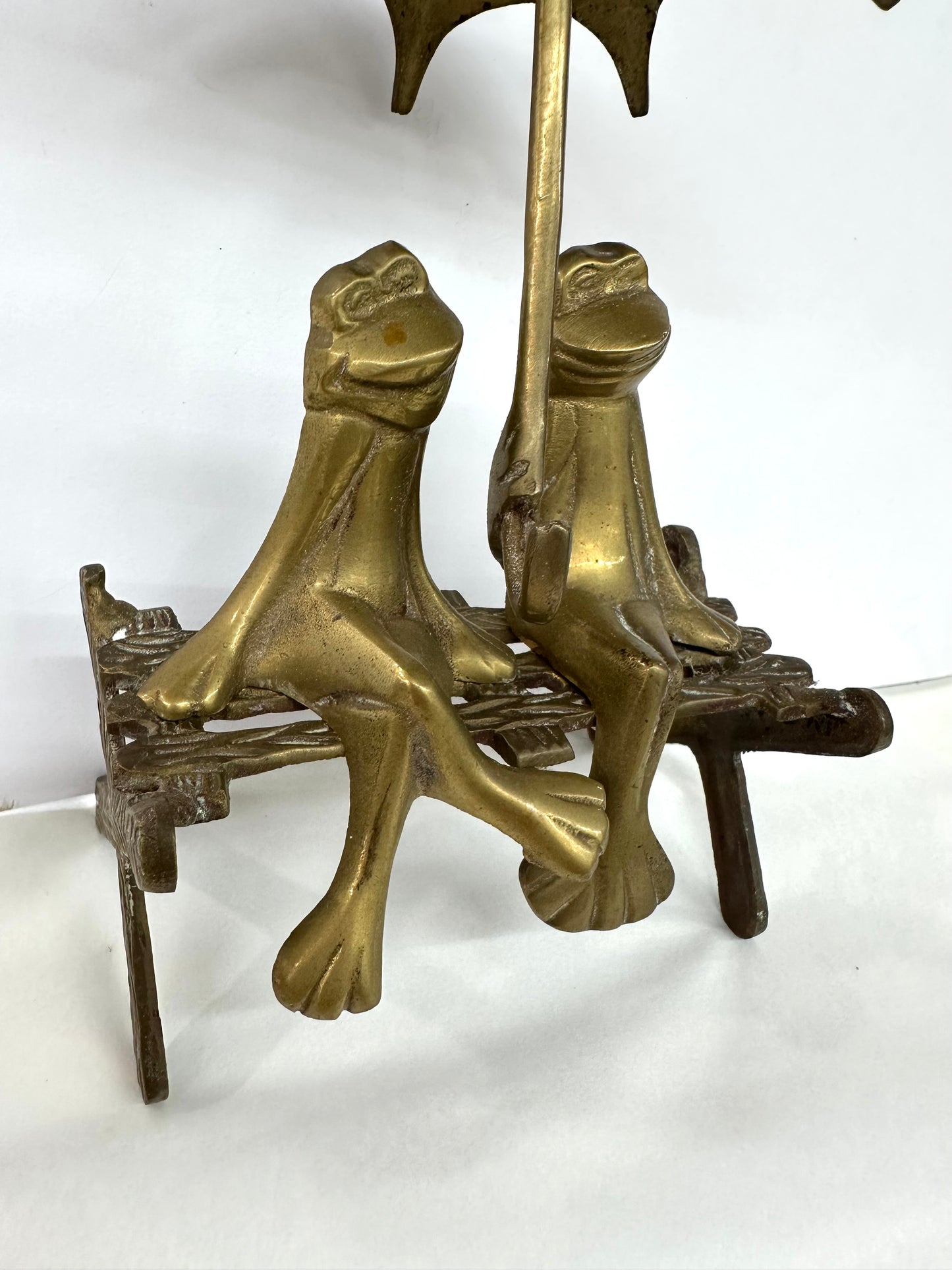 Brass Frogs On Bench