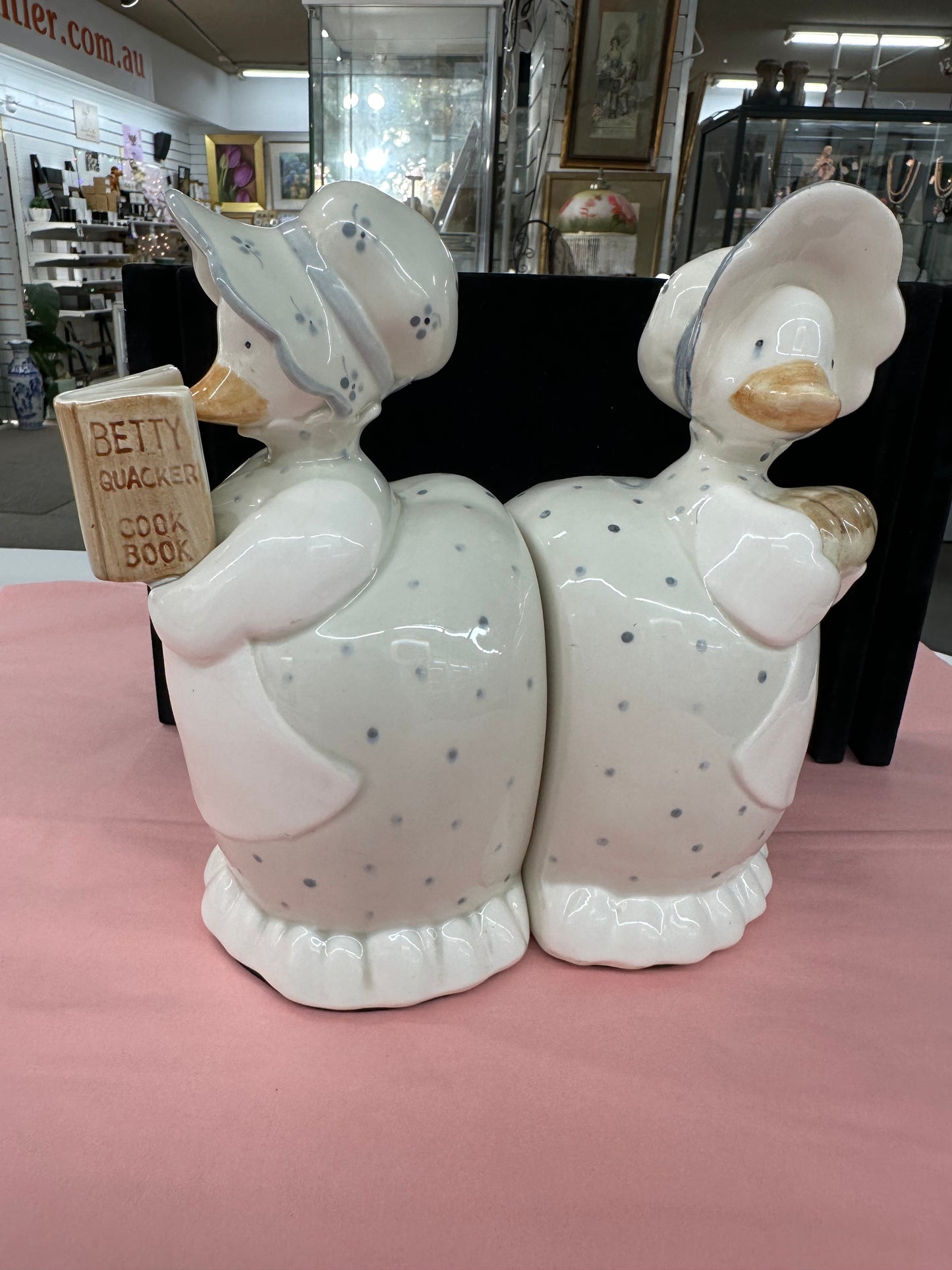 1980s Fitz & Floyd Betty Quacker ceramic bookend, l