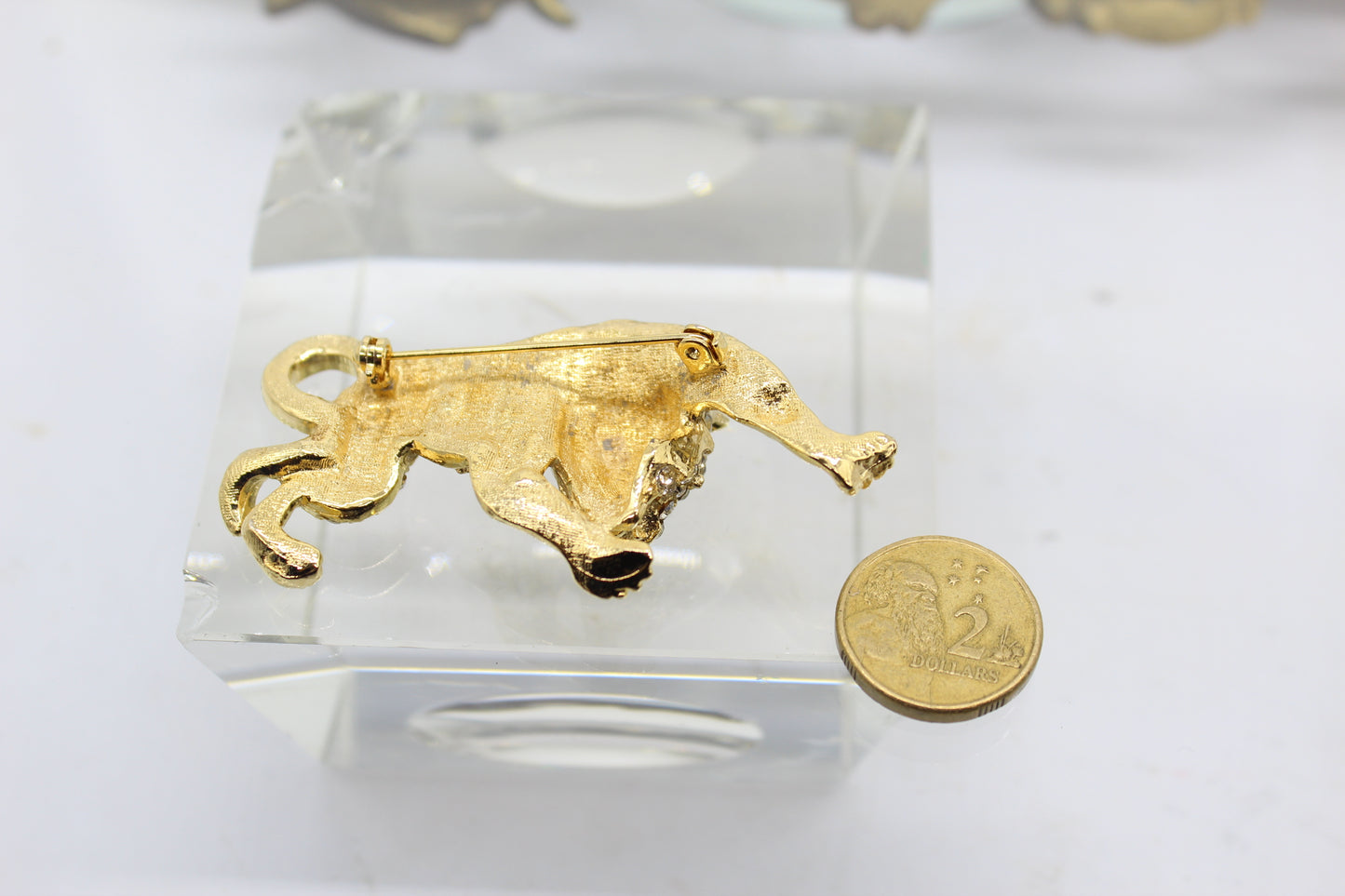 Gold Plated Leopard Brooch with Clear and Black Rhinestones circa 1980s