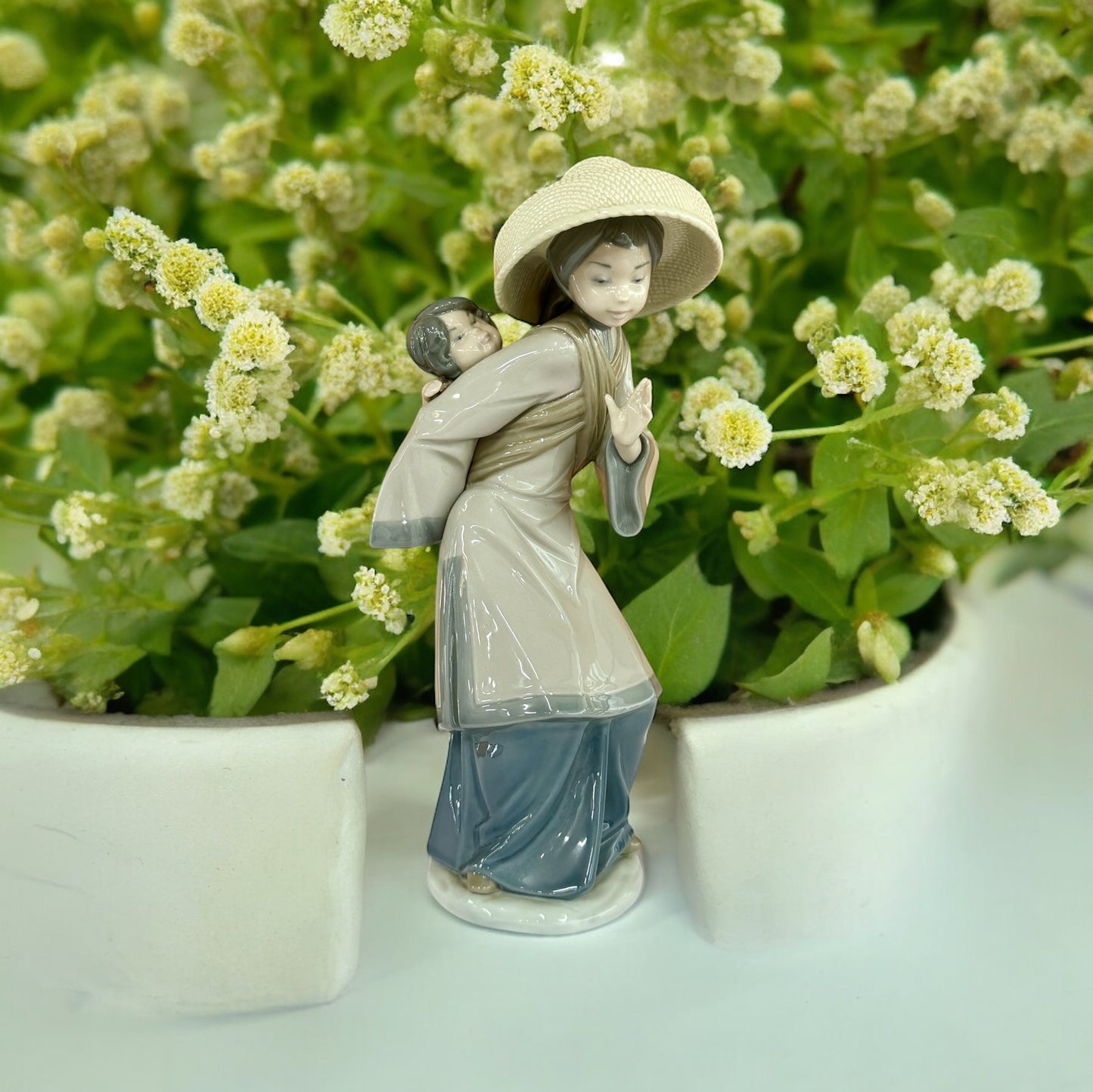 Lladro #5123 “My Precious Bundle”.