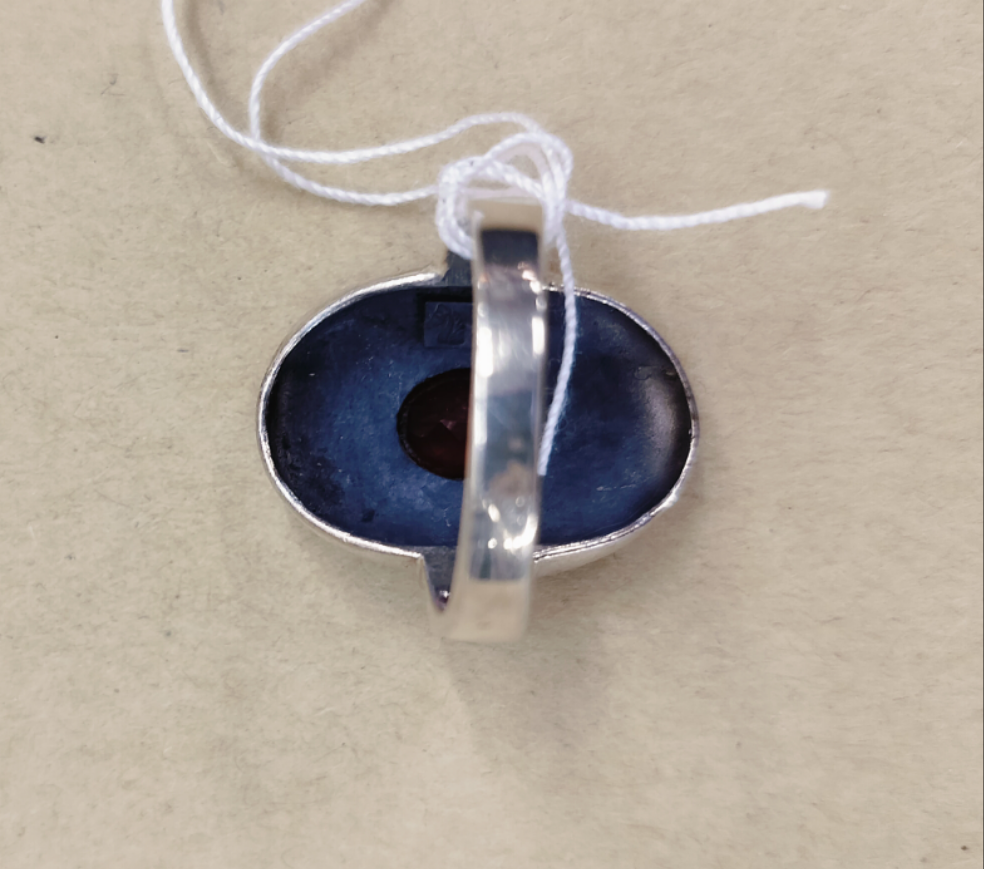 925 sterling silver + Garnet. Size - 18