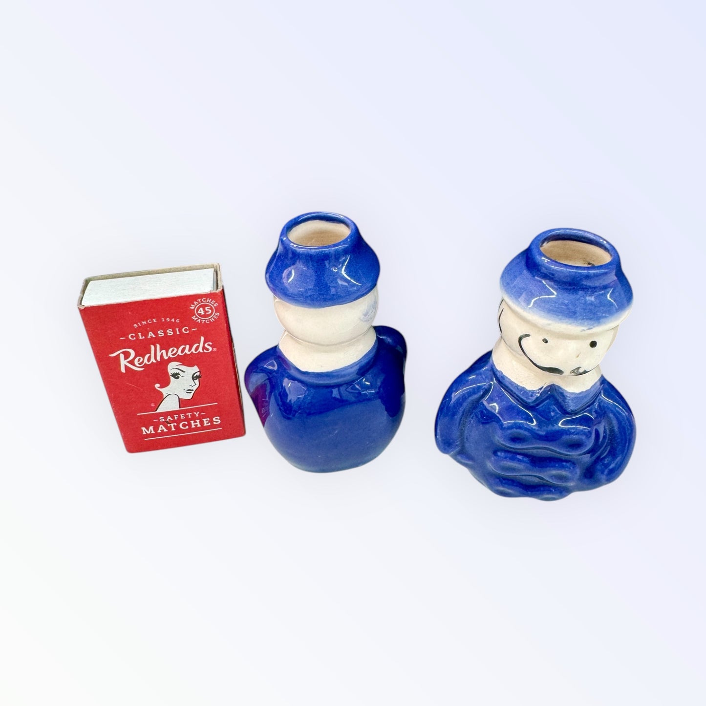 Vintage policeman porcelain candleholders