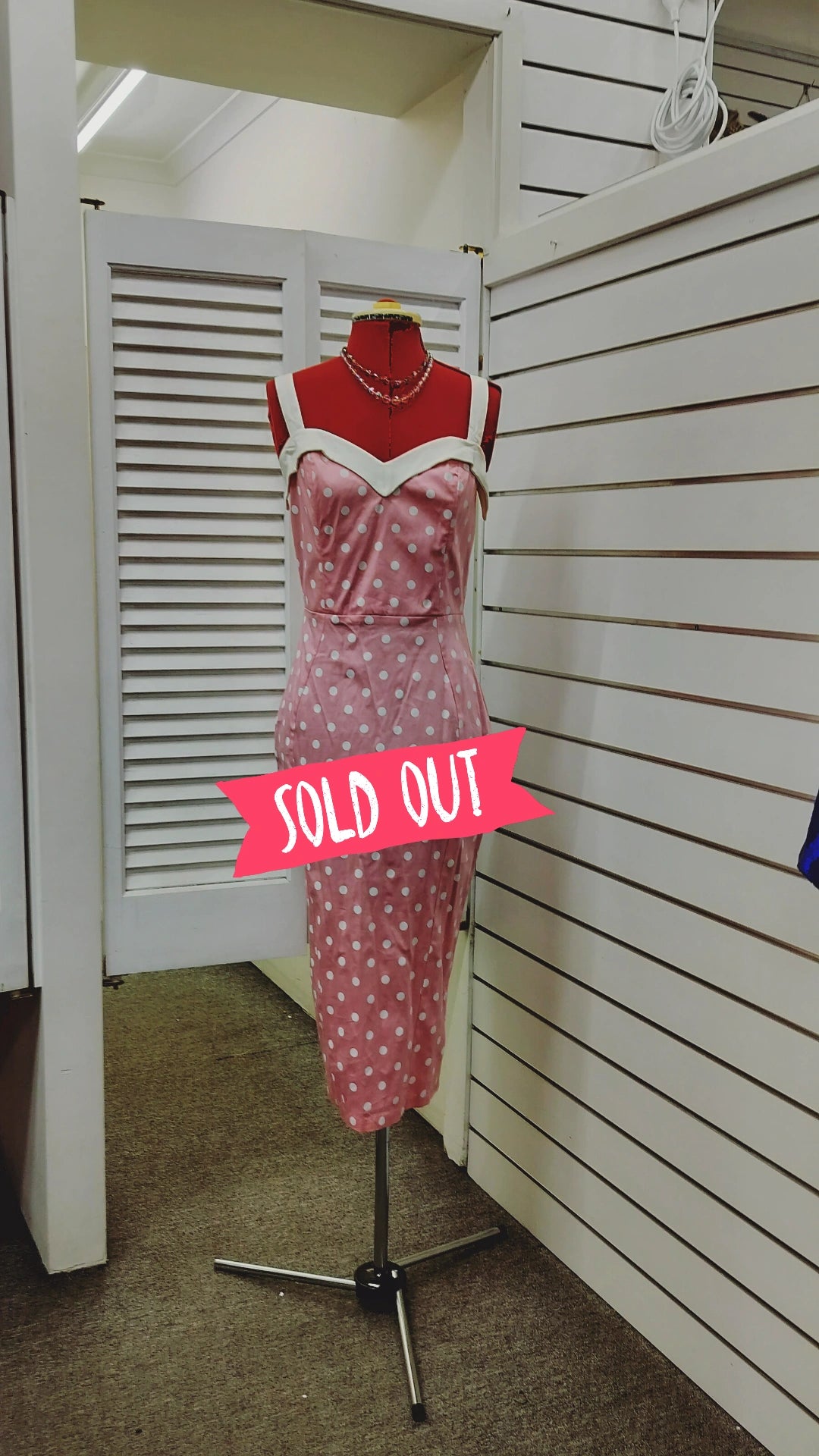 Deadly Dames label, us made, white polka dots over pink colour. Size- large.