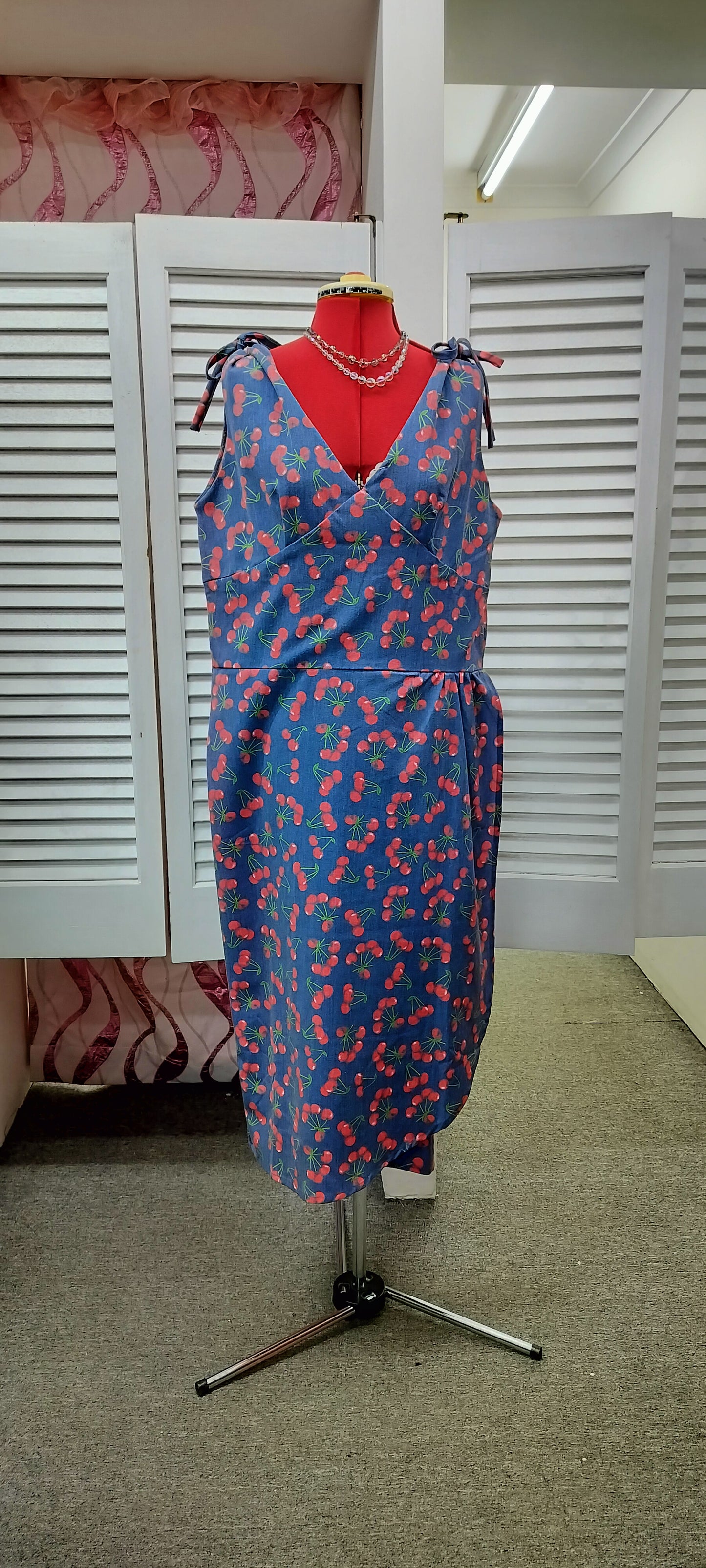 Bettie Page blue base with Cherry print pinup dress. Size- 3XL.