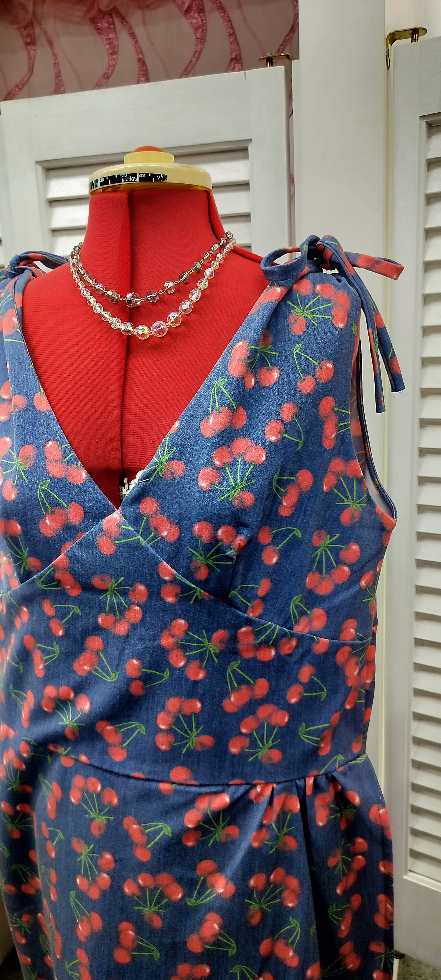Bettie Page blue base with Cherry print pinup dress. Size- 3XL.