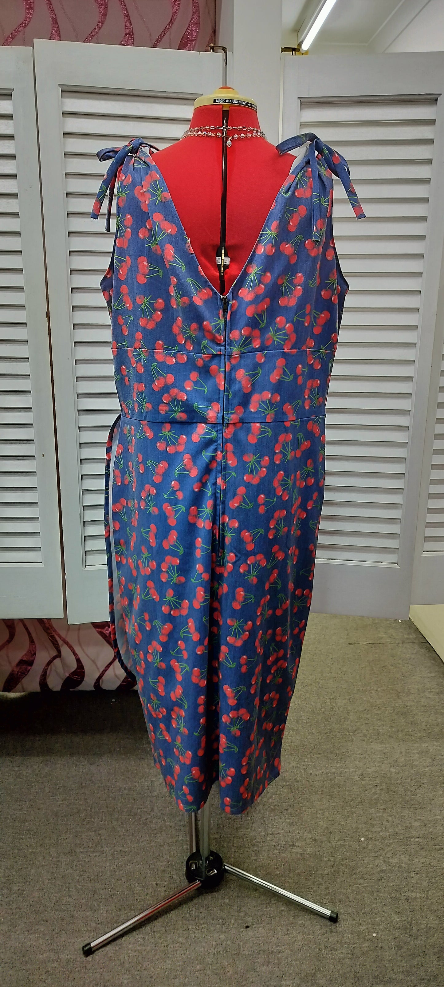 Bettie Page blue base with Cherry print pinup dress. Size- 3XL.