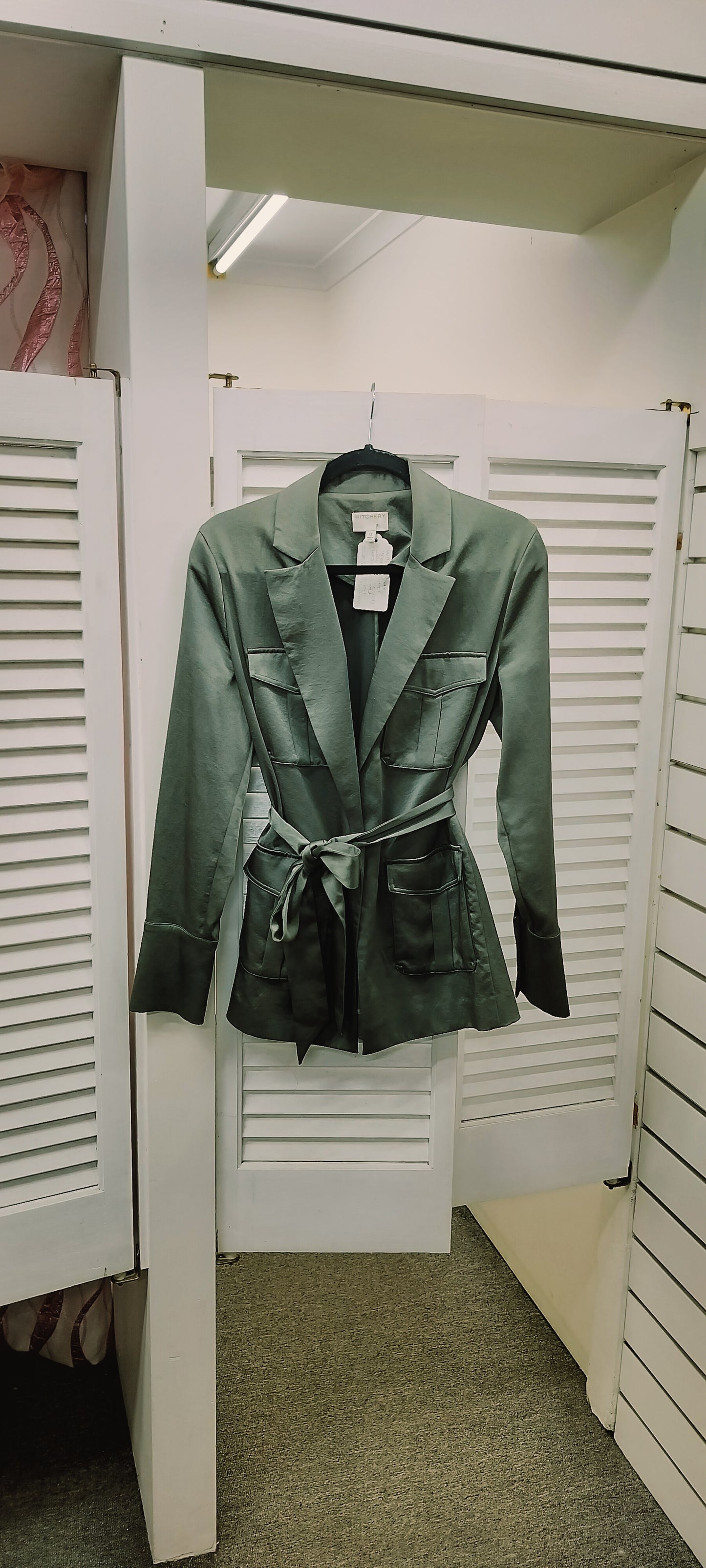 Witchery sage green jacket with stylish belt, lots of pockets for use. Size- 12.