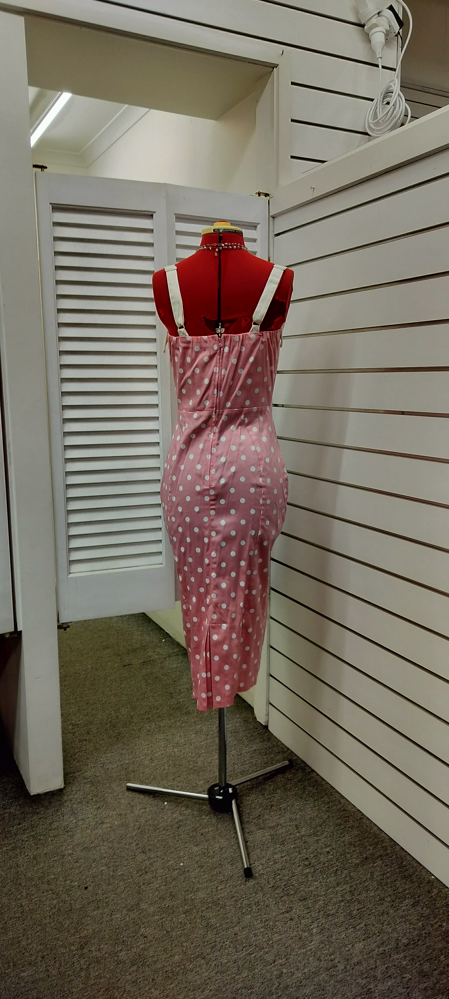 Deadly Dames label, us made, white polka dots over pink colour. Size- large.