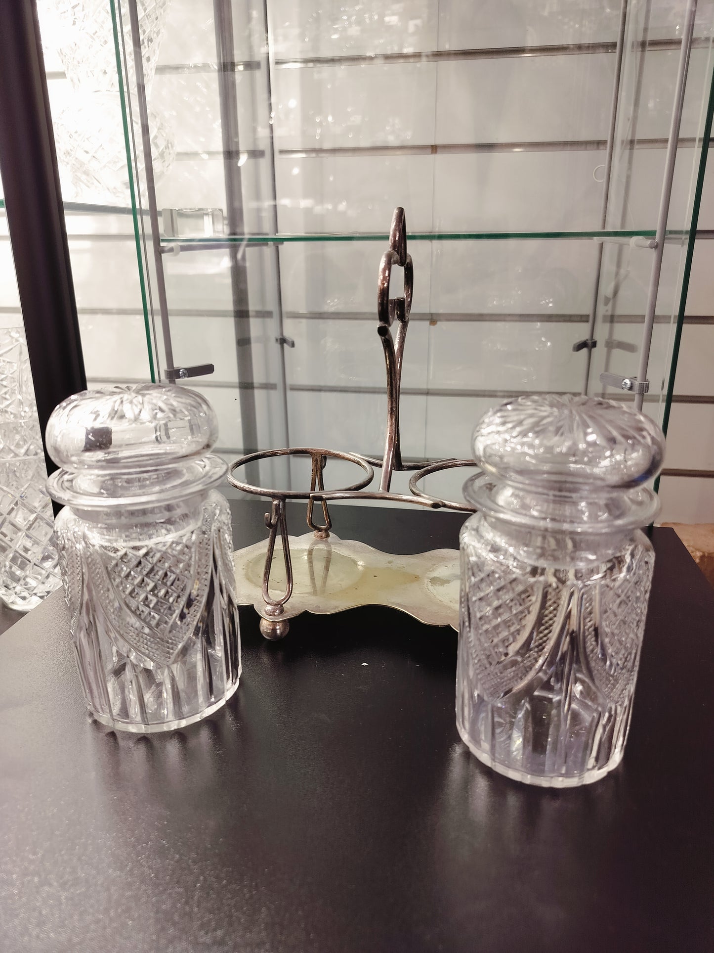 Crystal salt and pepper set with the holder.