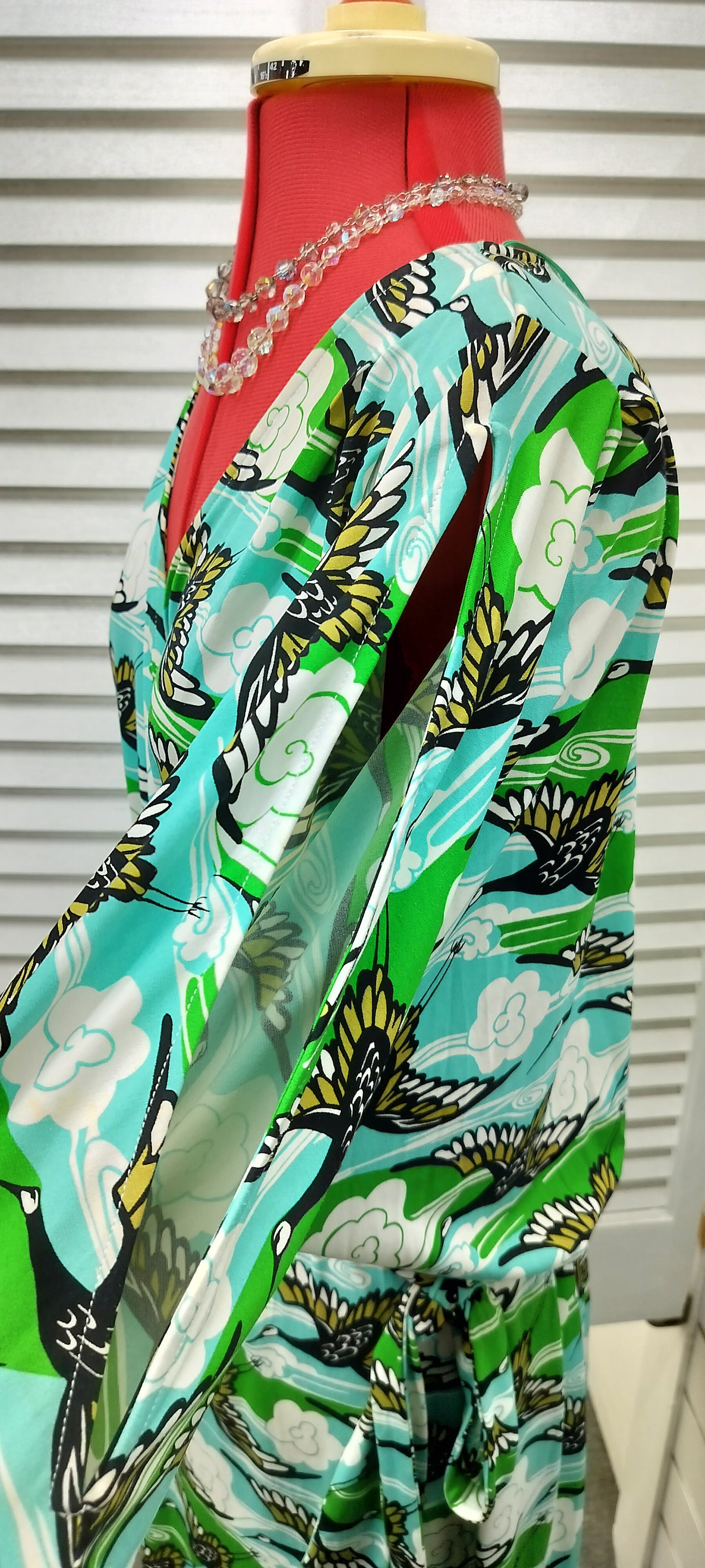 Gorgeous Leona, aque + green with black cranes dress, with belt along. Size-14.