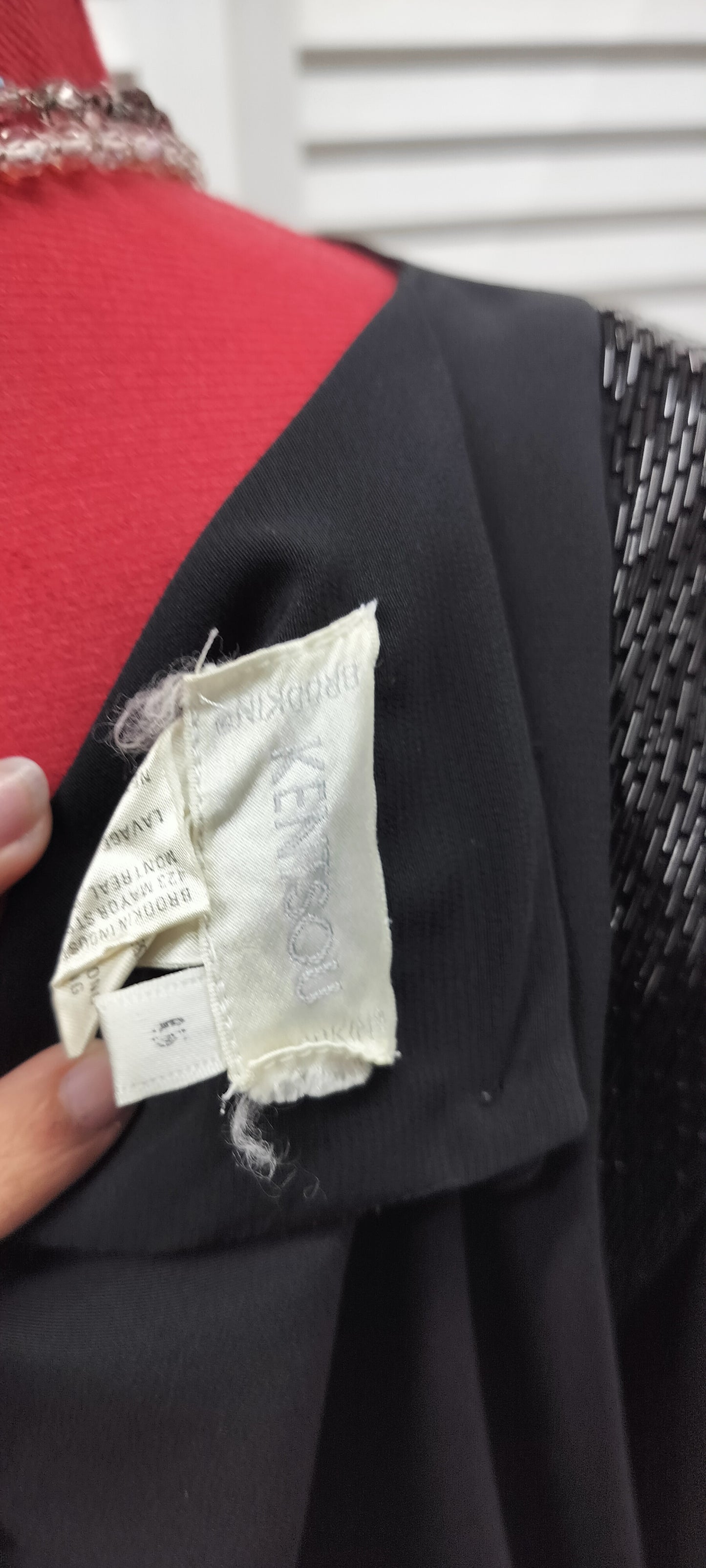 Kentsou black 80's style dress with some beading work on shoulders. Size- M-L.