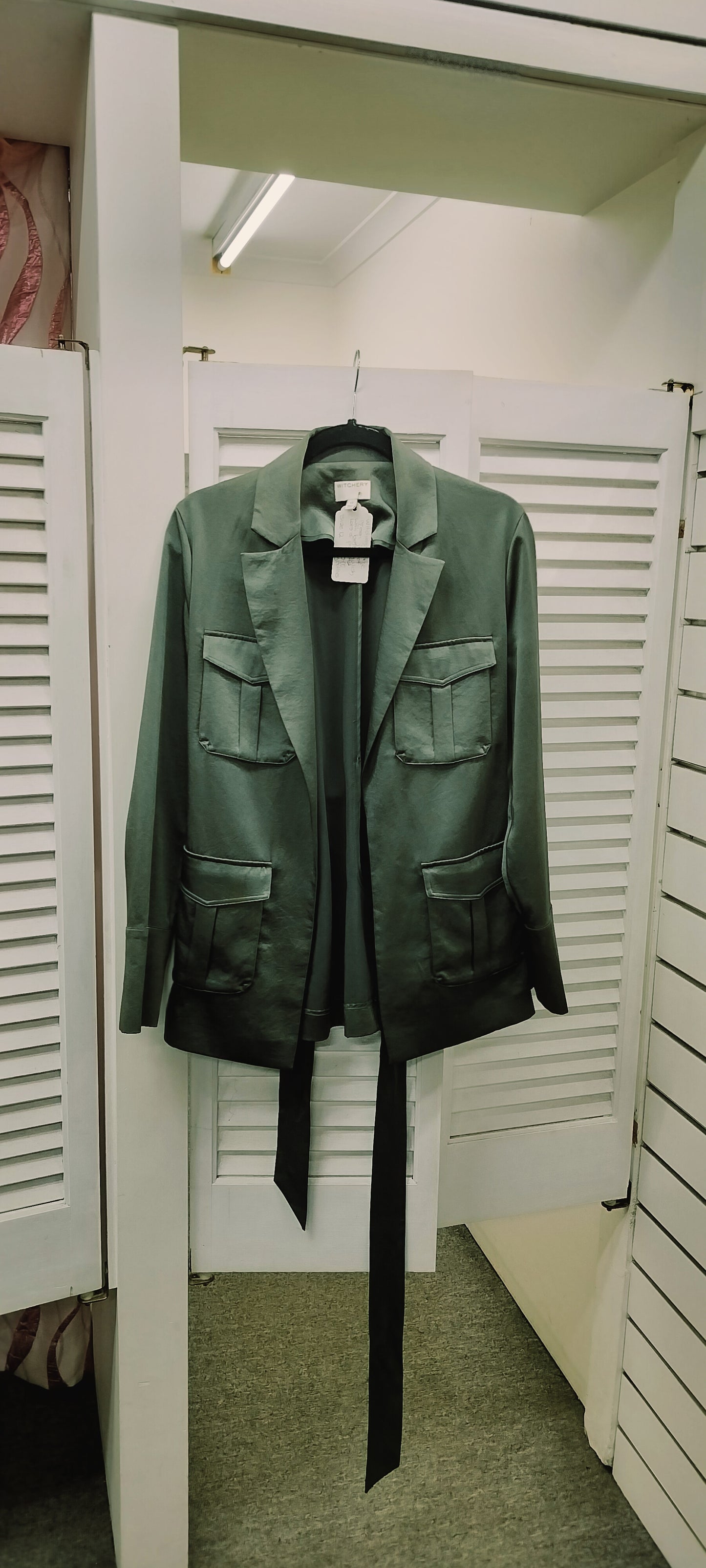 Witchery sage green jacket with stylish belt, lots of pockets for use. Size- 12.