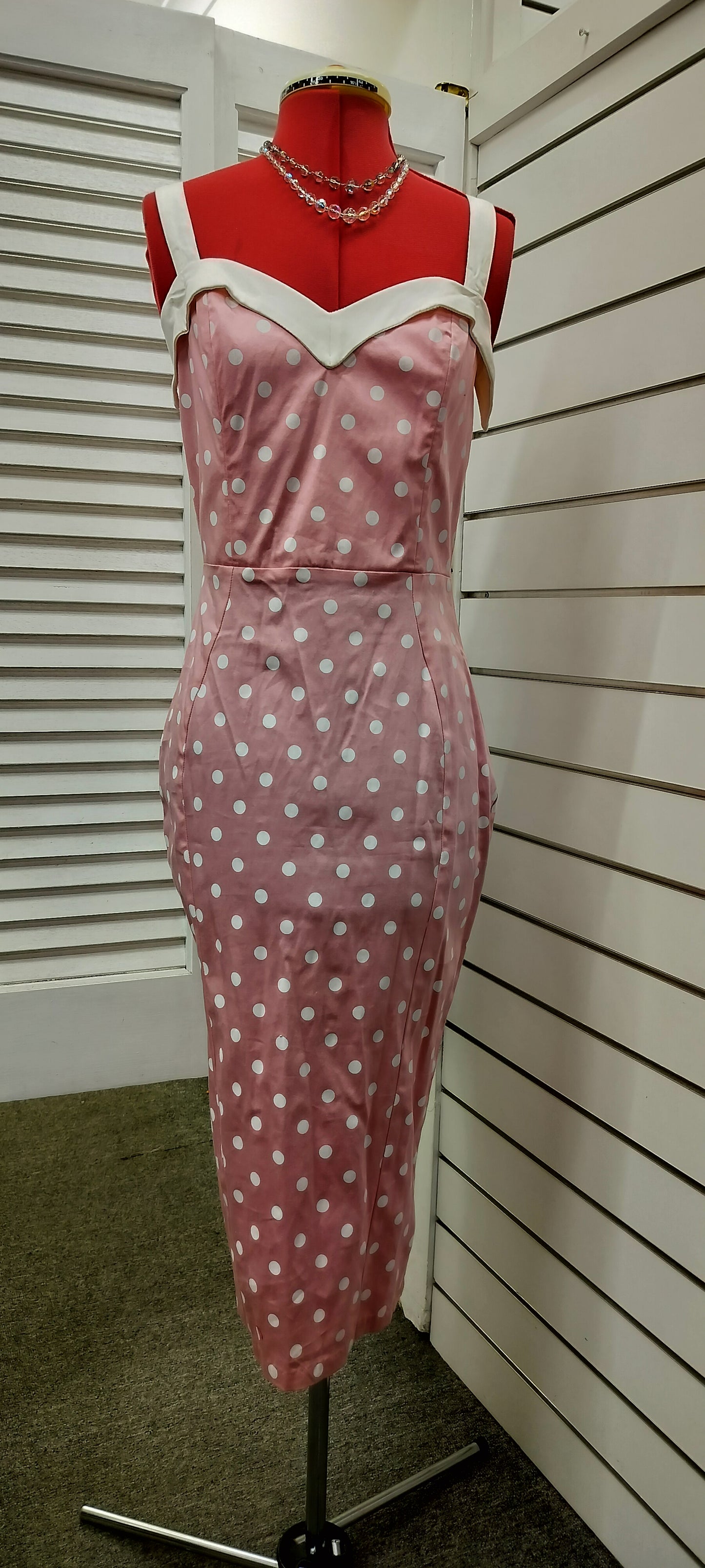 Deadly Dames label, us made, white polka dots over pink colour. Size- large.