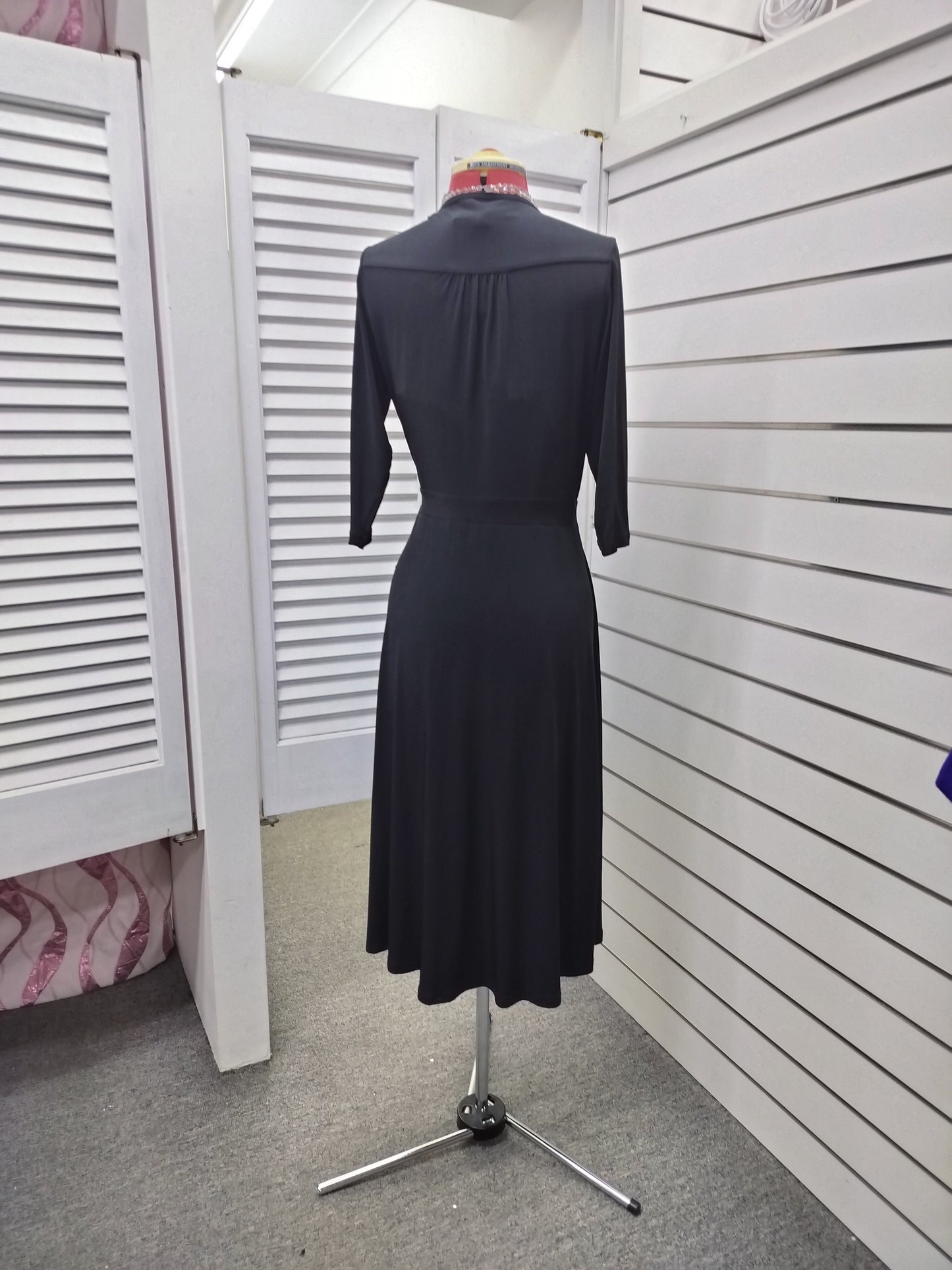 Bird by DESIGN, jersey wrap around black dress with wrap around. Size-12.