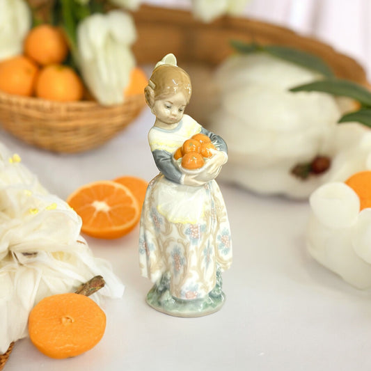 Lladro 4841 Valencia Girl Carrying Basket of Oranges Porcelain, Made in Spain 1973