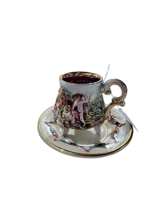 1970s R. Capodimonte Relief Cherubs Cup and Saucer,