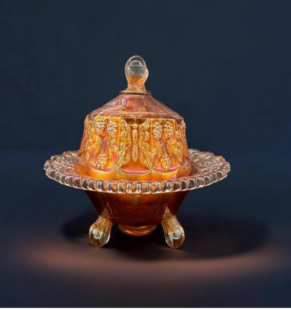Rare Fenton Carnival Glass “Butterfly & Berry” Covered Butter Dish – Marigold, Three-Footed (c.1920)