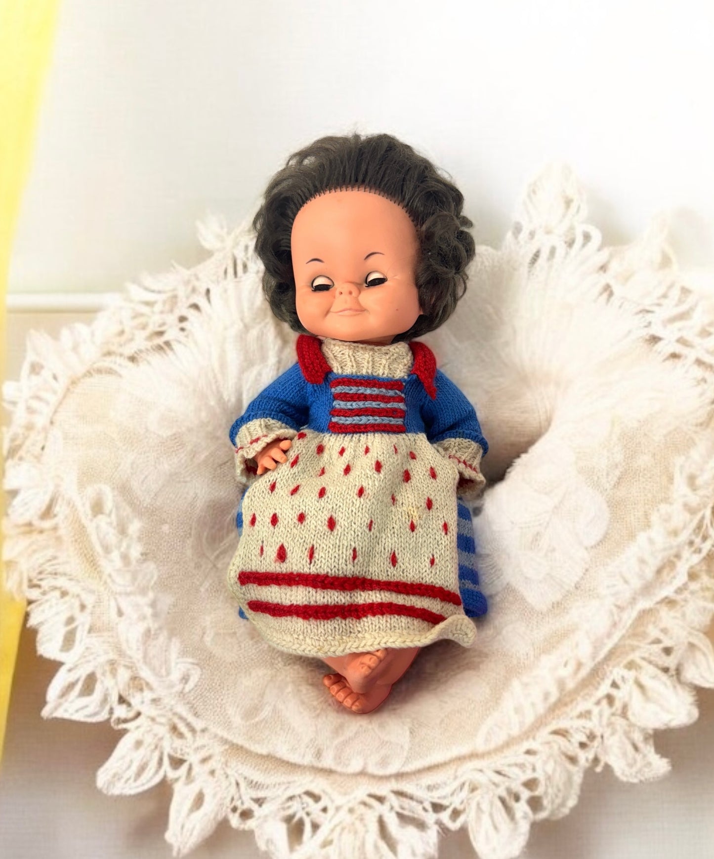 vintage doll, made in England marked, hand knit dresses