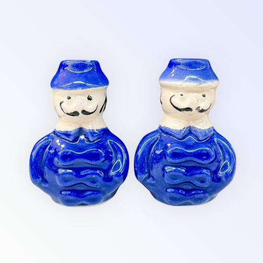 Vintage policeman porcelain candleholders