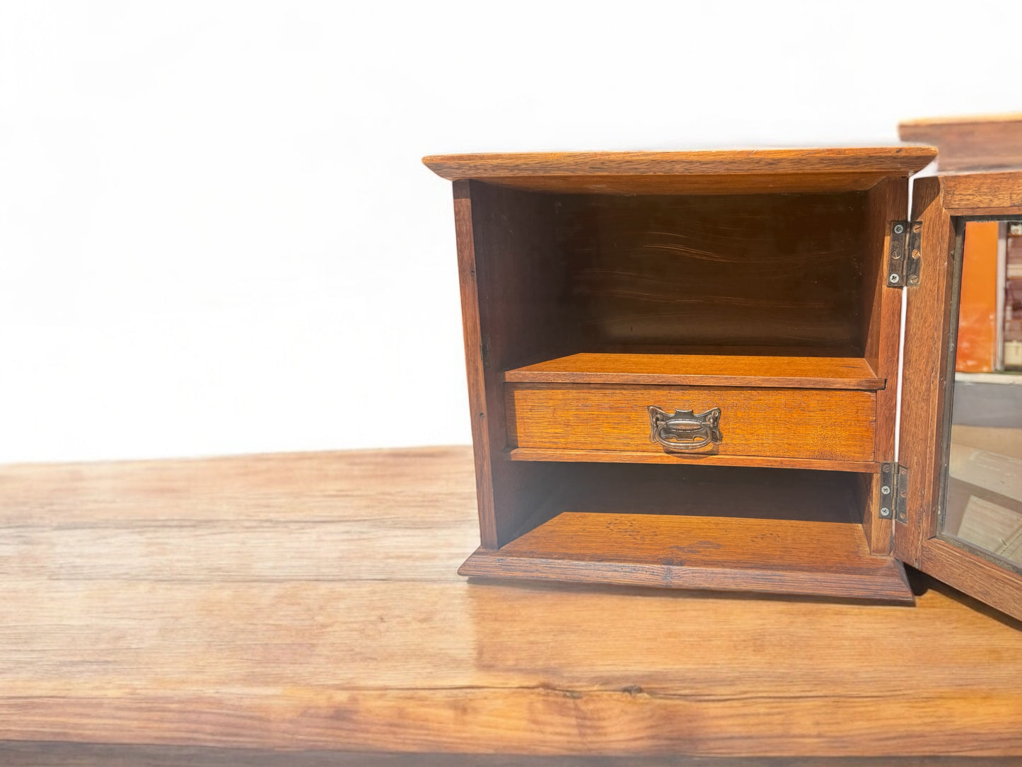 vintage wooden cabinet with drawer and glass door