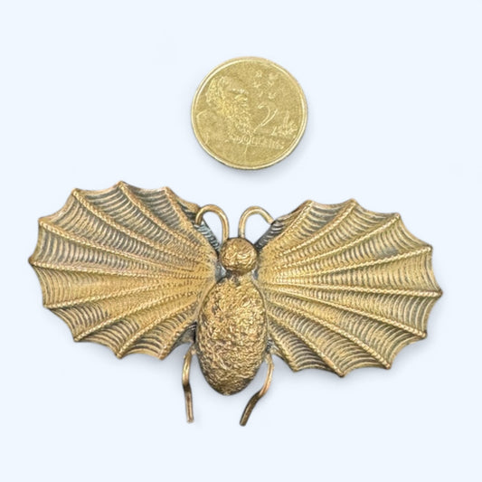vintage brass color metal Bat brooch
