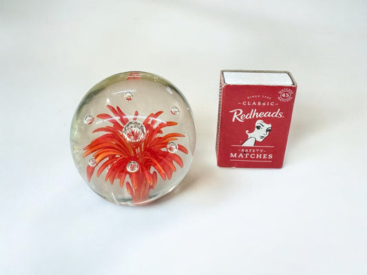 Orange Seagrass hand blown art glass paperweight, red flower