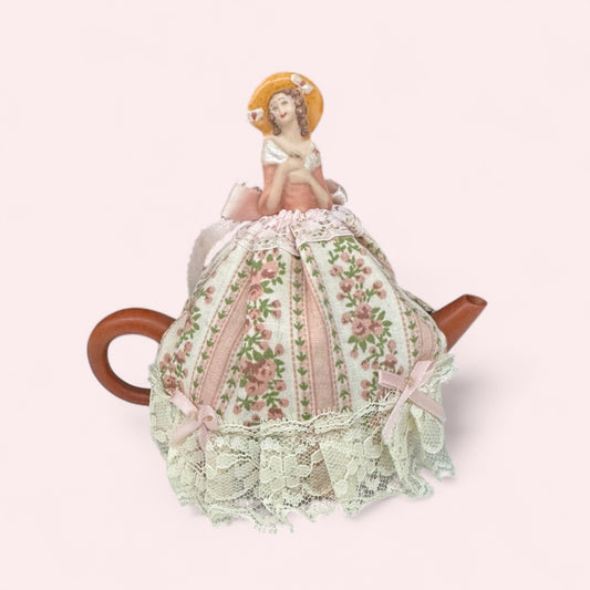 Chinese Clay teapot with porcelain doll tea cover