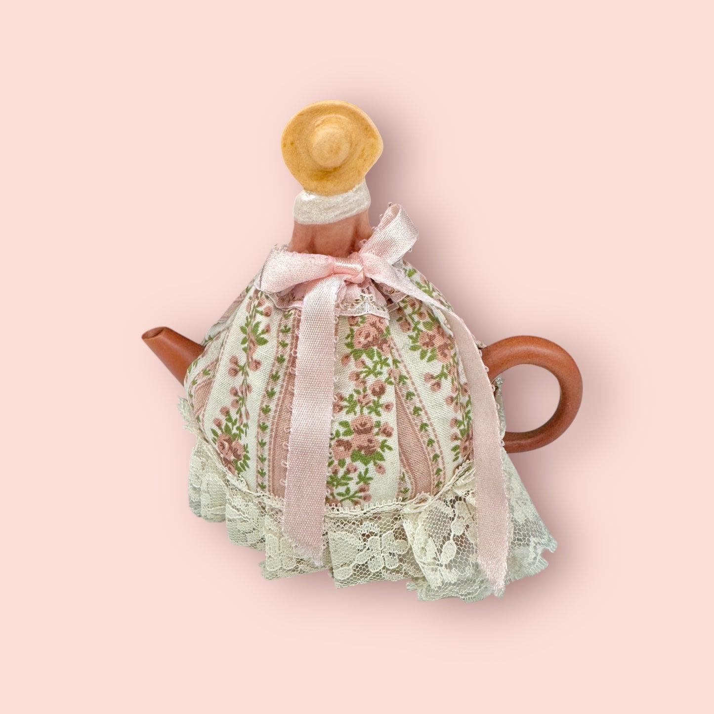 Chinese Clay teapot with porcelain doll tea cover