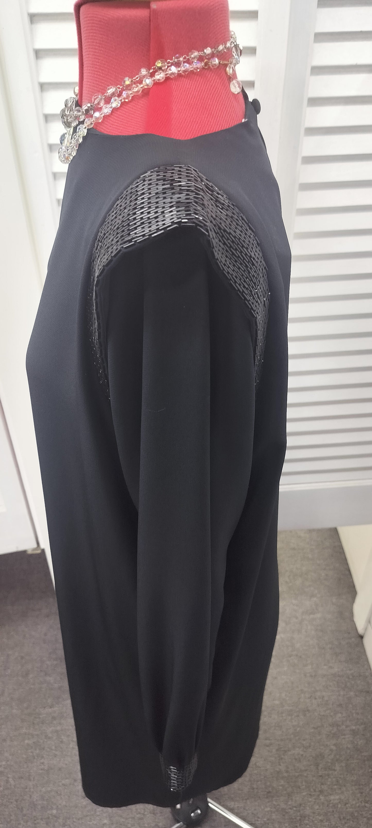 Kentsou black 80's style dress with some beading work on shoulders. Size- M-L.