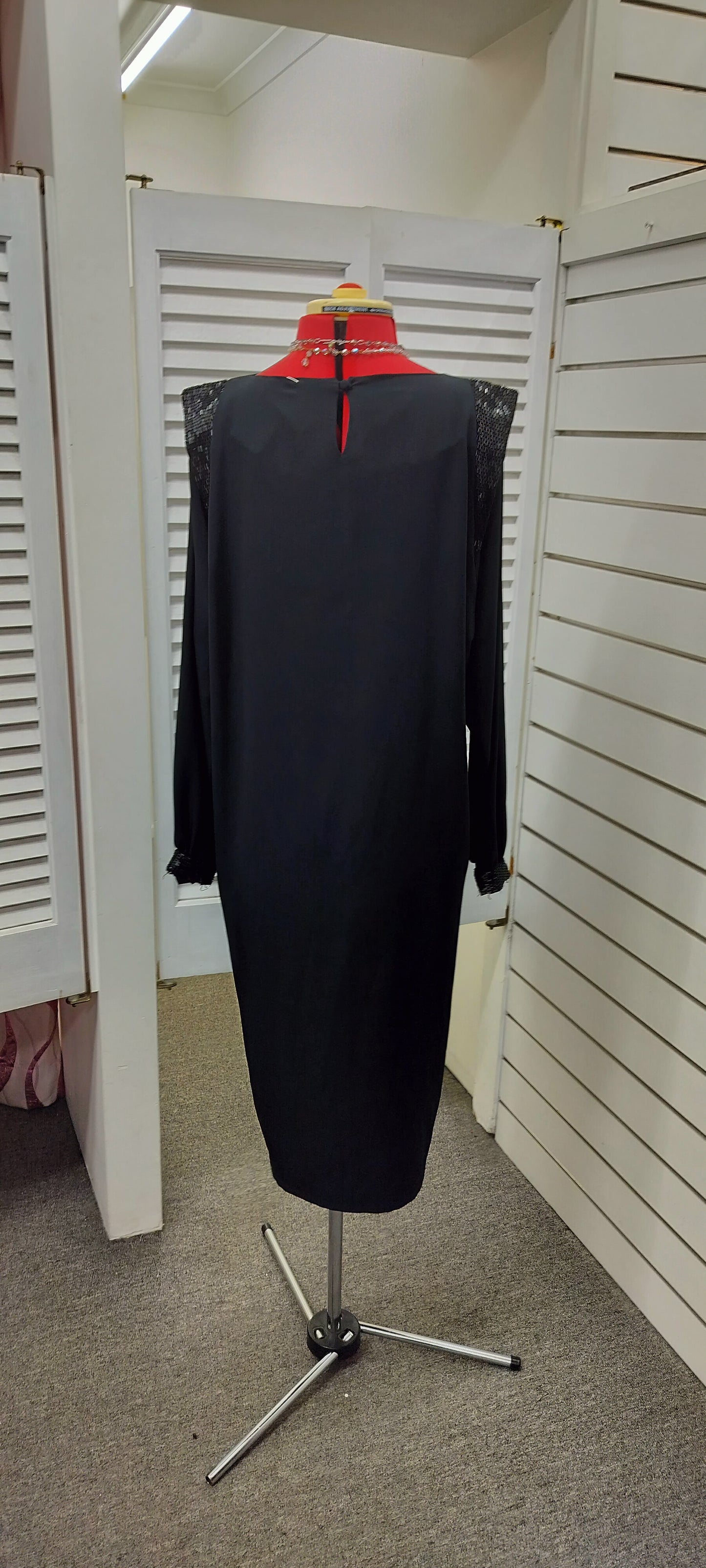 Kentsou black 80's style dress with some beading work on shoulders. Size- M-L.